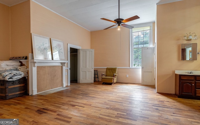99 W Main St, Gibson, GA 30810 - bedroom featuring crown molding, light wood finished floors, and a ceiling fan