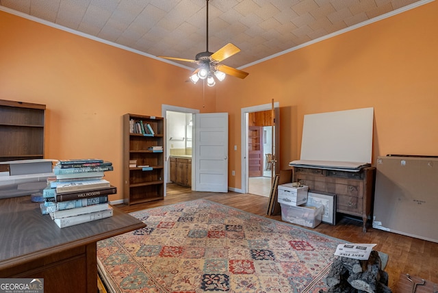 99 W Main St, Gibson, GA 30810 - office featuring crown molding, a ceiling fan, and wood finished floors