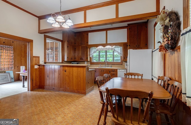 99 W Main St, Gibson, GA 30810 - dining space featuring light floors, a chandelier, and ornamental molding