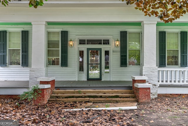 99 W Main St, Gibson, GA 30810 - doorway to property with a porch