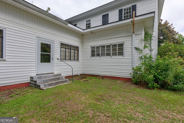 99 W Main St, Gibson, GA 30810 - back of property with entry steps and a yard