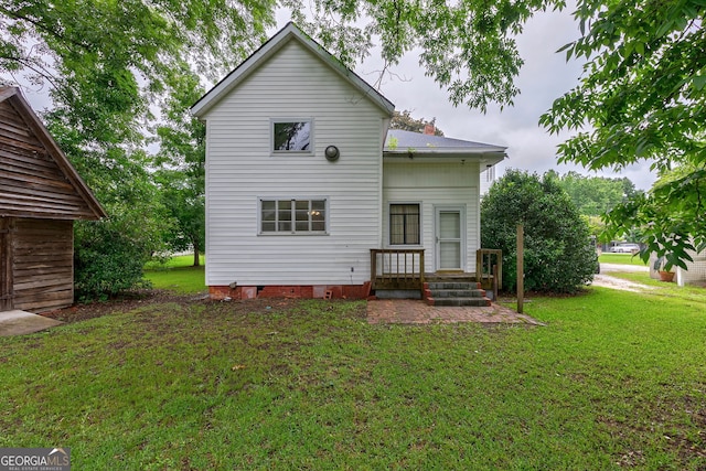 99 W Main St, Gibson, GA 30810 - back of house with a yard