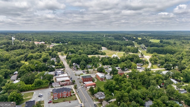 99 W Main St, Gibson, GA 30810 - drone / aerial view of a heavily wooded area