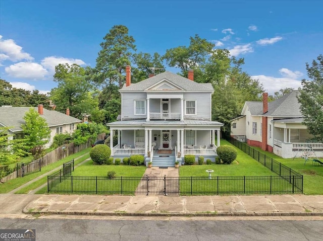 view of front of home featuring a porch and a front yard