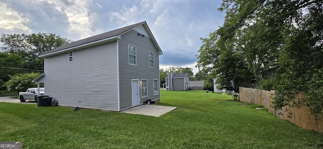 view of property exterior with a yard