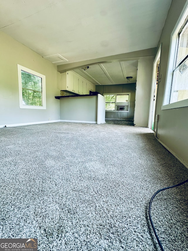 unfurnished living room with cooling unit