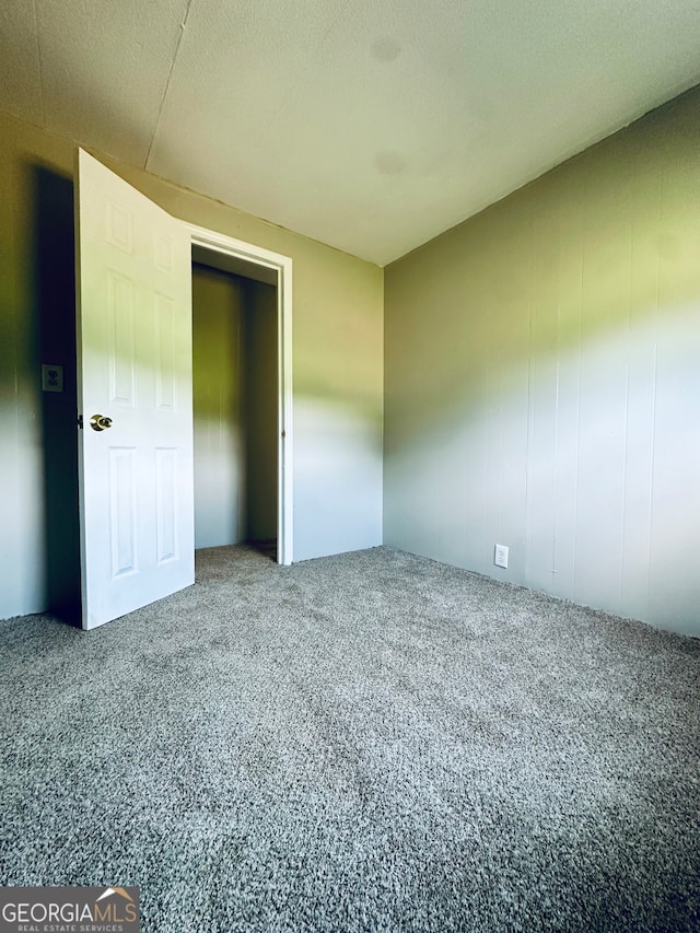 unfurnished bedroom featuring carpet floors