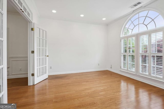 unfurnished room featuring light wood-type flooring