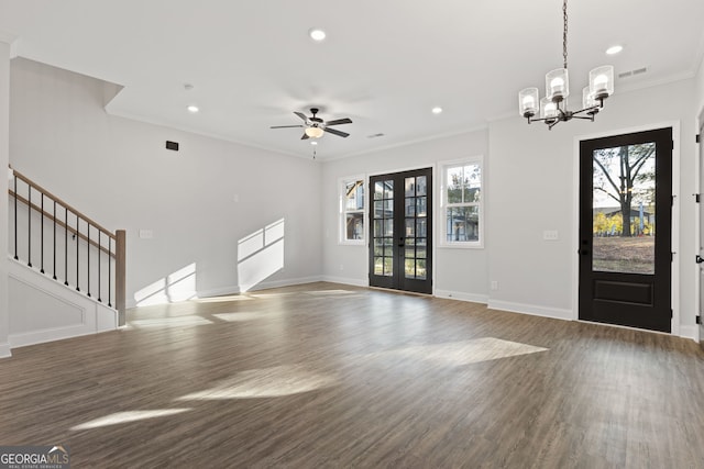 dining space featuring light hardwood / wood-style flooring, ornamental molding, and a chandelier