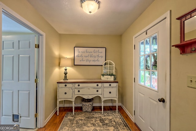 office area with hardwood / wood-style flooring and plenty of natural light