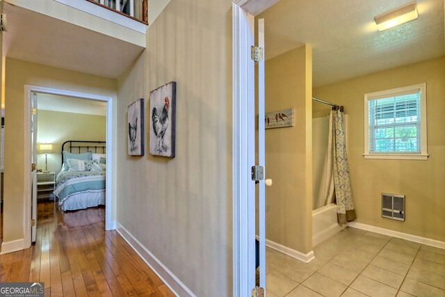 hall featuring light hardwood / wood-style floors