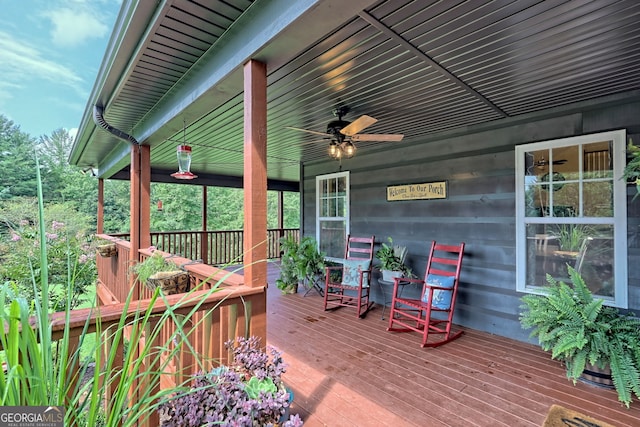 wooden terrace with ceiling fan