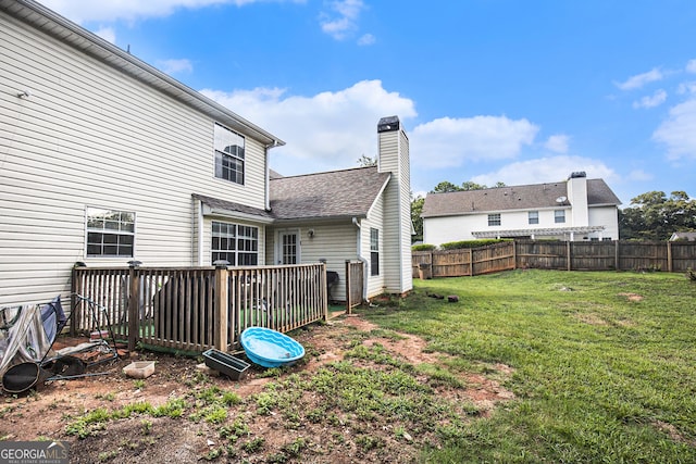 view of yard featuring a deck