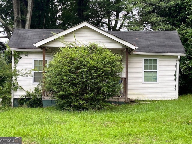 view of home's exterior featuring a yard