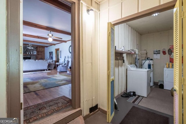 laundry area with hardwood / wood-style flooring, separate washer and dryer, water heater, and ceiling fan