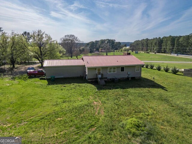 exterior space with a front lawn