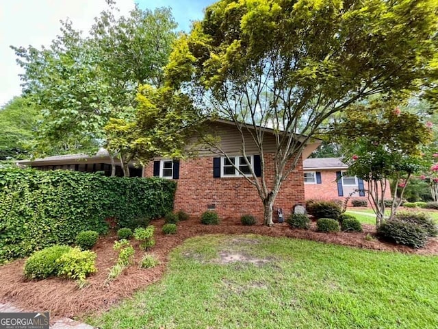 view of home's exterior featuring a lawn