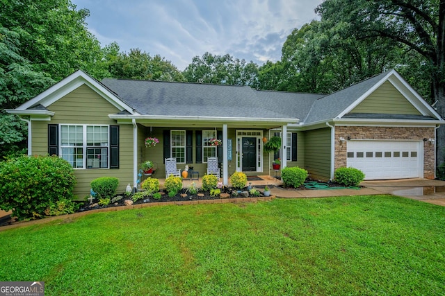 ranch-style home with a porch, a garage, and a front yard