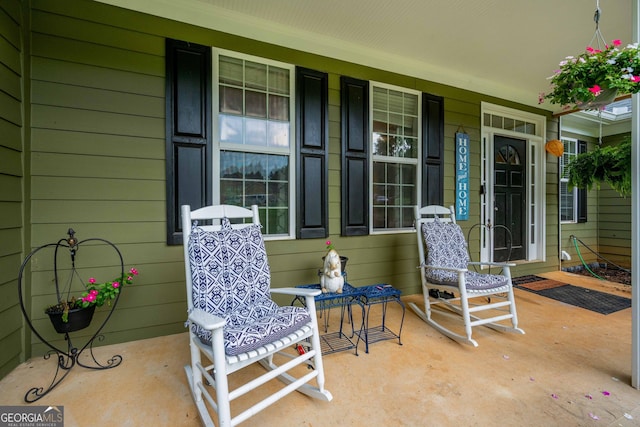 view of patio featuring covered porch