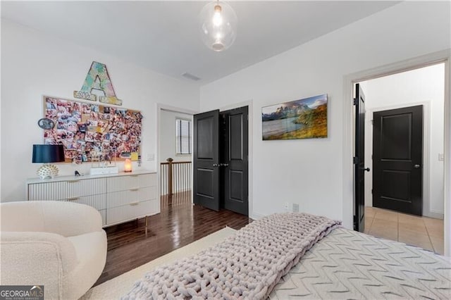 bedroom featuring light wood-type flooring