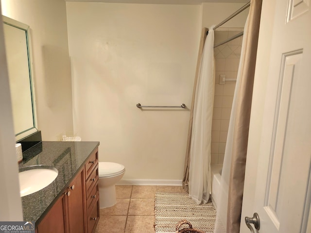 full bathroom with tile patterned floors, shower / tub combo with curtain, vanity, and toilet