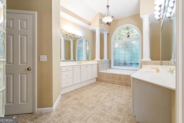 bathroom with vanity, tile patterned flooring, and a relaxing tiled tub