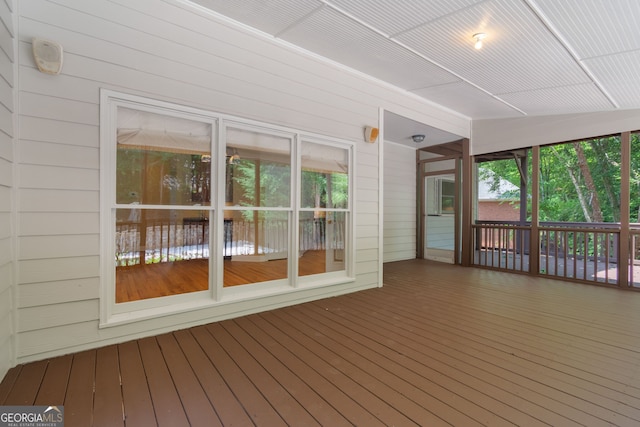 unfurnished sunroom with a healthy amount of sunlight