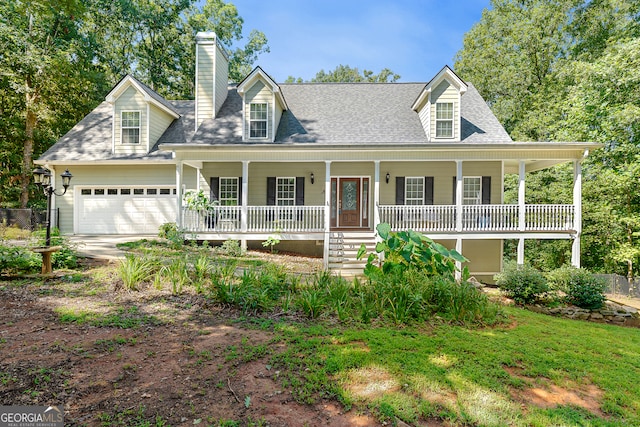 cape cod house featuring a porch and a garage