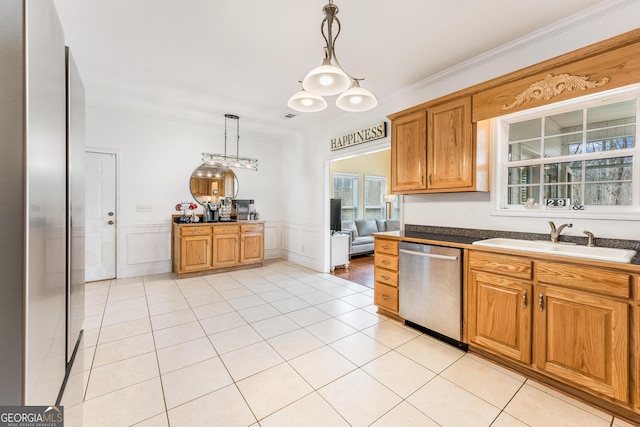 kitchen featuring light tile patterned flooring, stainless steel dishwasher, pendant lighting, sink, and ornamental molding