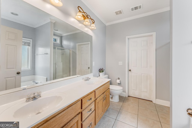 full bathroom with double sink vanity, toilet, tile patterned floors, plus walk in shower, and ornamental molding