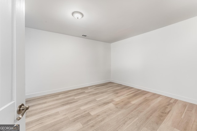 empty room with light wood-type flooring