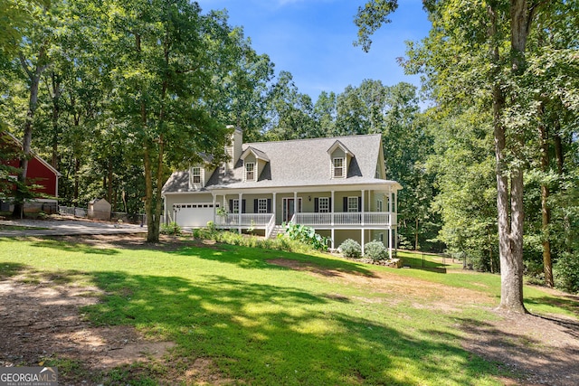 cape cod house with a front yard, covered porch, and fence