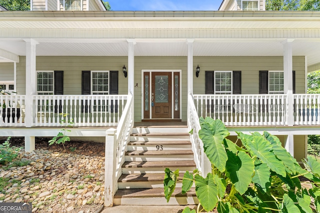 doorway to property with covered porch