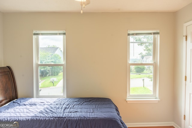 bedroom featuring multiple windows