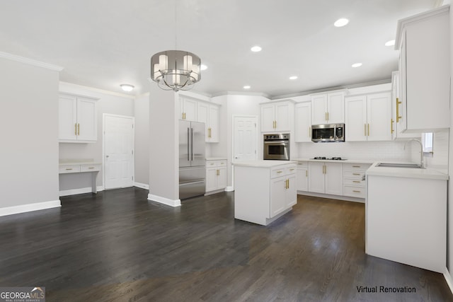 kitchen with stainless steel appliances, a sink, white cabinetry, and crown molding