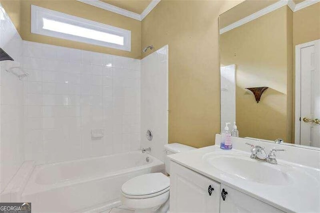 full bathroom featuring toilet, vanity, crown molding, and bathing tub / shower combination