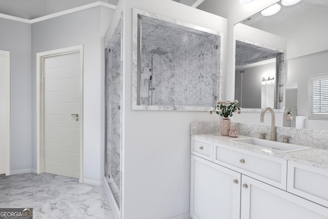 full bath with marble finish floor, a marble finish shower, baseboards, and vanity