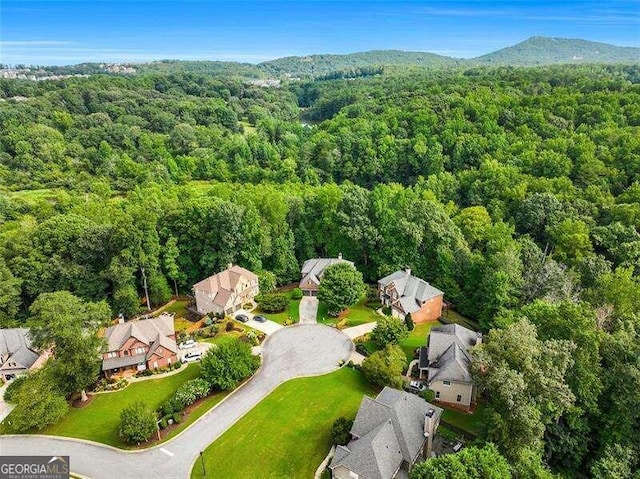 bird's eye view featuring a view of trees