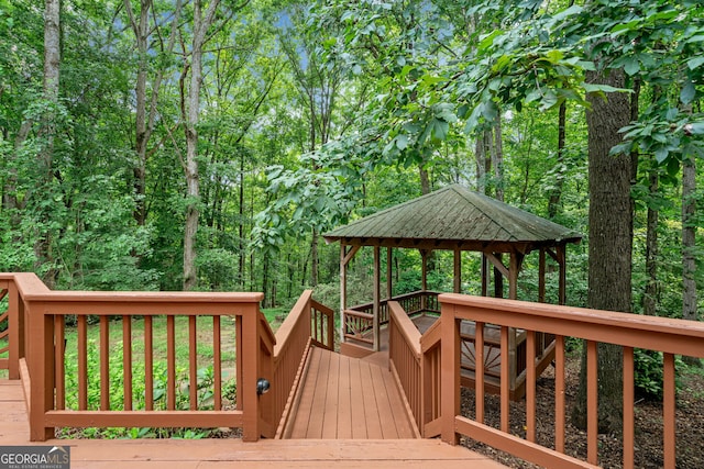 wooden deck featuring a gazebo