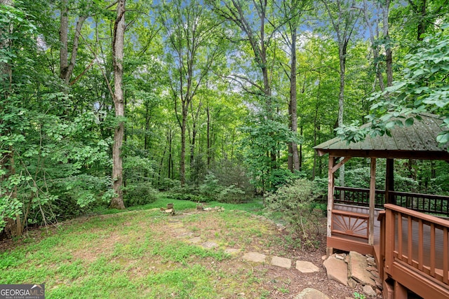 view of yard with a gazebo and a deck