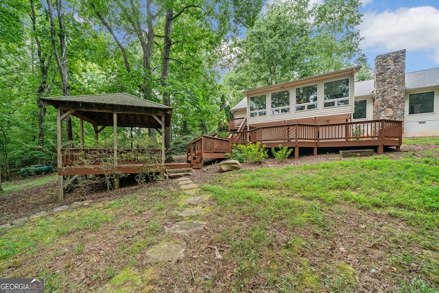 view of yard featuring a deck