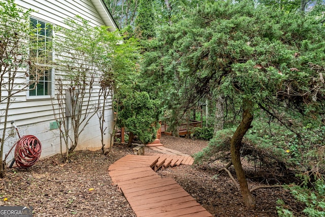 view of yard with a deck