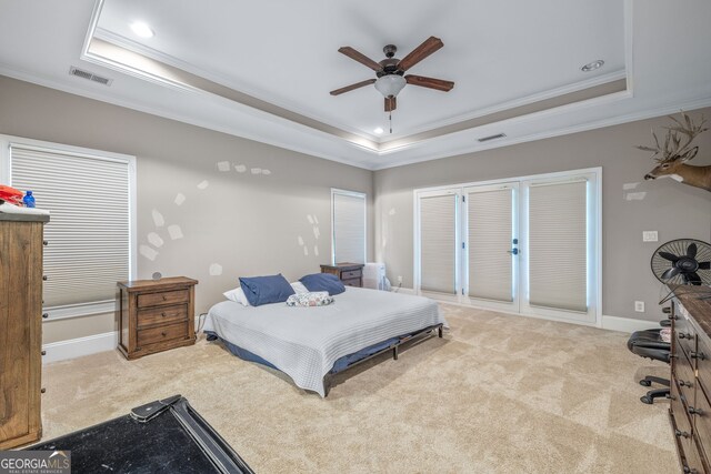 living room with light hardwood / wood-style floors, built in shelves, crown molding, and ceiling fan