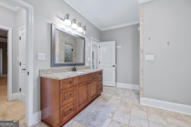 bathroom with vanity, ornamental molding, tile patterned flooring, and toilet