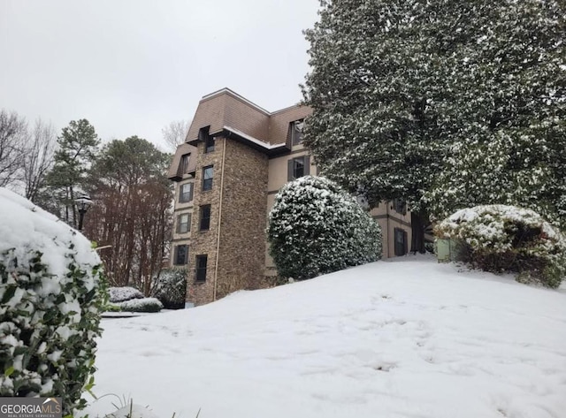 view of snow covered building