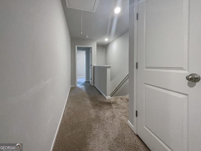 hallway with carpet flooring