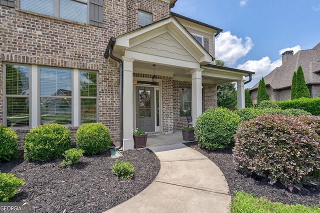 entrance to property featuring covered porch