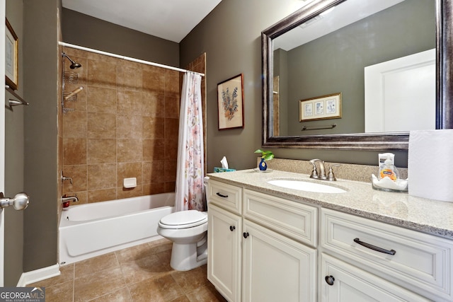 full bathroom with tile patterned floors, vanity, toilet, and shower / bath combo with shower curtain