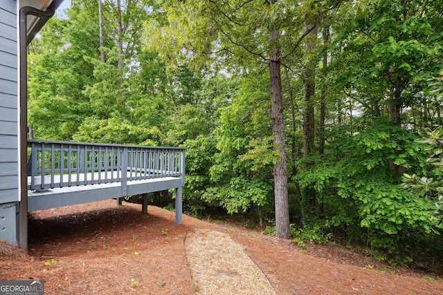 exterior space featuring a wooden deck