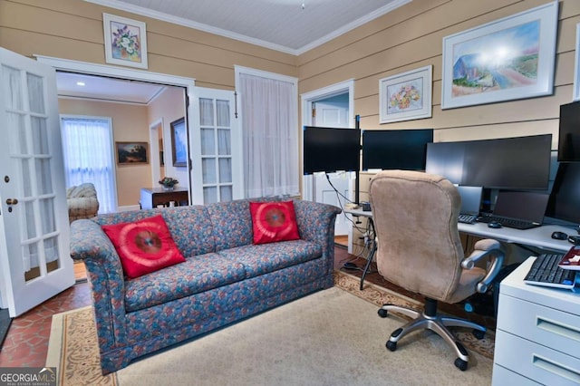 office space with wooden walls and crown molding